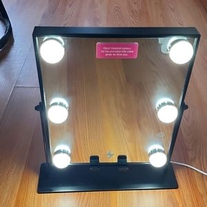 Black bluetooth and wifi charger mirror